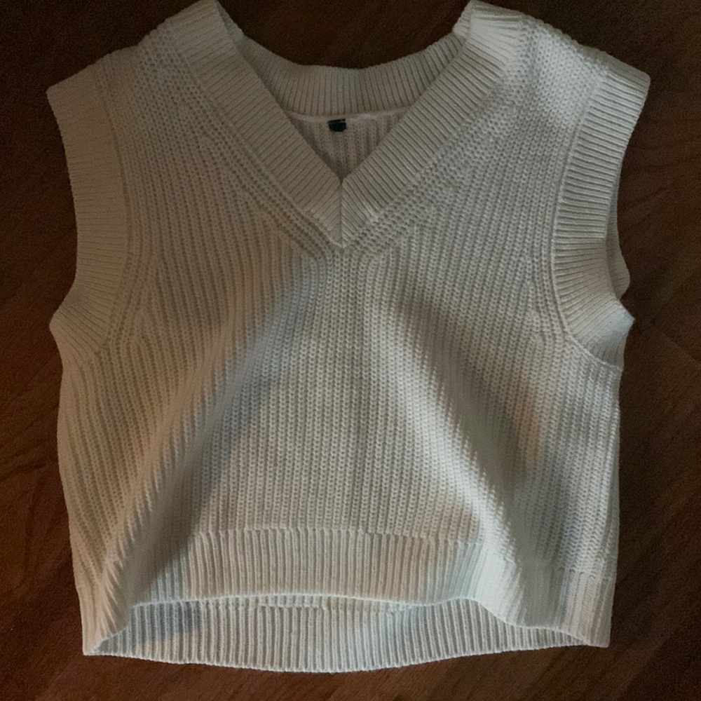 White sweater vest
